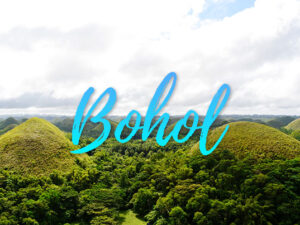 Chocolate hills featured in this Bohol Travel Guide