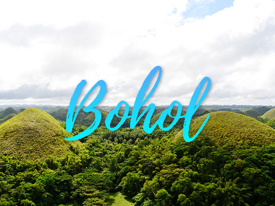 Chocolate hills featured in this Bohol Travel Guide