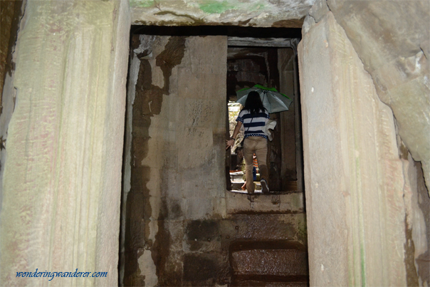 Slippery wet stairs inside Bayon Temple