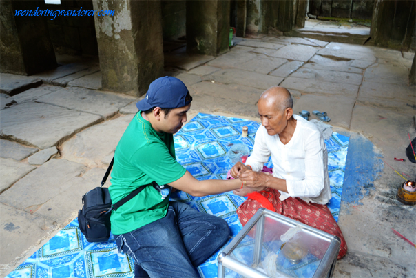 Prayer inside Banteay Kdei - Siem Reap, Cambodia