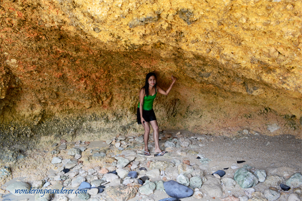 Large yellow land wall in Long Beach, San Antonio Island